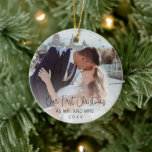 Our First Christmas Elegant Photo Newlywed Ceramic Ornament<br><div class="desc">Did you get married this year? Add a memory to your tree with this modern ornament featuring a simple design with with the message "Our First Christmas as Mr. and Mrs. " in an elegant thin black script along with the year over your favorite photo. Add the same photo to...</div>
