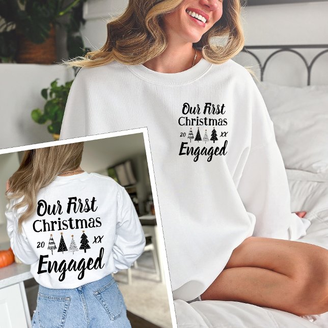 Our First Christmas Engaged 2023 Couple Crewneck Sweatshirt (Creator Uploaded)