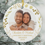 Our First Christmas Engaged Gold Foliage Photo Ceramic Ornament<br><div class="desc">This elegant Engagement Christmas Ornament is decorated with gold foliage on a white background.
Easily customizable with your photo,  names,  and year.
Original Watercolor © Michele Davies.</div>