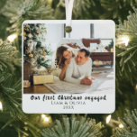 Our First Christmas Engaged Minimal Couple Photo Metal Ornament<br><div class="desc">An elegant and chic glass ornament with unique vintage script . The year and names are customizable . This newlywed  ornament has a couple photo that can be changed with your own photo. Grab this ornament  and make this occasion captured forever.</div>
