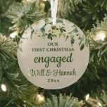 Our First Christmas Engaged Personalized Couple Glass Ornament<br><div class="desc">Our First Christmas Engaged Ornament,  Personalized new Couple Names Christmas,  Moving Housewarming Gift for them,  keepsake couples present from friends,  Personalised Anniversary 1st xmas tree,  romantic boyfriend girlfriend move in,  living together second 2nd third,  custom apartment house 3rd year,  him her flat condo townhouse,  home warming party greenery sand</div>