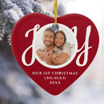Our First Christmas Engaged Photo Red Heart-Shaped Ceramic Ornament<br><div class="desc">This keepsake red heart-shaped First Christmas Engaged photo ceramic ornament is decorated with the word JOY in stylish white script typography. Easily customizable.</div>