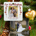 Our first Christmas married 2 photo modern Metal Ornament<br><div class="desc">Married couple's first Christmas as Mr. and Mrs. unique keepsake tree ornament with red berries branches,  your custom photo,  and red modern typography script text.           Can be a beautiful gift for newlyweds.</div>