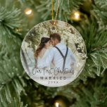 Our First Christmas Married Newlywed Photo Ceramic Ornament<br><div class="desc">Did you get married this year? Add a memory to your tree with this modern ornament featuring a simple design with with the message "Our First Christmas Married" in an elegant thin black script along with the year over your favorite photo. Add the same photo to both sides or a...</div>
