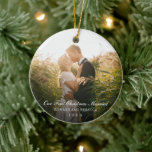 Our First Christmas Married Photo Elegant Newlywed Ceramic Ornament<br><div class="desc">Did you get married this year? Add a memory to your tree with this elegant keepsake ornament with the message "Our First Christmas Married" in white text over your favorite wedding photo. Use the template to add your names and the year. Add the same photo to both sides or a...</div>
