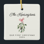 Our First Christmas Personalized Newlywed Photo Ceramic Ornament<br><div class="desc">Celebrate your first holiday season together with the Our First Christmas Personalized Newlywed Custom Photo Ceramic Ornament! Featuring a modern mistletoe painting alongside your favorite photo, this ornament combines romance with a contemporary design, making it a truly special wedding keepsake. Perfect for your own tree or as a thoughtful gift...</div>