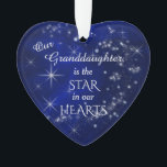 Our Granddaughter Star Ornament<br><div class="desc">Our best selling granddaughter Christmas ornament has been updated this year! It features a silver star and snowflake pattern against a deep blue gradient background. In the center is your customized text in white. It says "Our Granddaughter is the STAR in our HEARTS. The back of the ornament has the...</div>