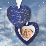 Our Grandson Star Photo Template Ornament<br><div class="desc">Here's a nice photo template Christmas ornament for that special grandson or son. It features a silver star and snowflake pattern against a deep blue gradient background. In the center is your customized text in white. It says "Our Grandson is the STAR in our HEARTS. The back of the ornament...</div>