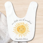 Our Little Ray Of Sunshine Baby Bib<br><div class="desc">This cute baby bib is decorated with a watercolor smiling sun and the words " Our Little Ray Of Sunshine" in stylish script typography.
Easily customizable.
Original Watercolor © Michele Davies.</div>