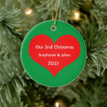 Our Second Christmas Together 2023 Cute Red Heart  Ceramic Ornament<br><div class="desc">Personalized names and printed with cute red heart design in solid green background. Feel free to customize by adding your own texts,  names or photos. You can add your photo on the back side of the ornament easily!
The color of the background can also be changed as you want.</div>