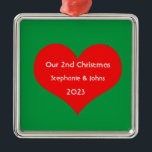 Our Second Christmas Together Cute Red Heart 2023  Metal Ornament<br><div class="desc">Personalized names and printed with cute red heart design in solid green background. Feel free to customize by adding your own texts,  names or photos. You can add your photo on the back side of the ornament easily!
The color of the background can also be changed as you want.</div>