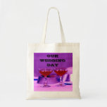 OUR WEDDING DAY TOTE BAG<br><div class="desc">OUR WEDDING DAY with glasses sitting on a Table 
that's on a TOTE BAG or Grocery Bag.</div>