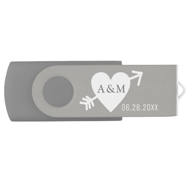 Our Wedding photos saved on a gray Flash Drive (Front)