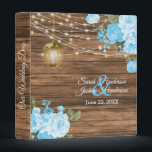 Our Wedding | Wood, Lantern & Baby Blue Flower 3 Ring Binder<br><div class="desc">Wedding Photo Album or Planner featured in a rustic wood background with beautiful baby blue rose and tulip flowers, a glowing lantern and trendy string lights ready for you to personalize. ⭐This Product is 100% Customizable. Graphics and / or text can be added, deleted, moved, resized, changed around, rotated, etc......</div>