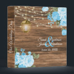 Our Wedding | Wood, Lantern & Baby Blue Flower 3 Ring Binder<br><div class="desc">Wedding Photo Album or Planner featured in a rustic wood background with beautiful baby blue rose and tulip flowers, a glowing lantern and trendy string lights ready for you to personalize. ⭐This Product is 100% Customizable. Graphics and / or text can be added, deleted, moved, resized, changed around, rotated, etc......</div>
