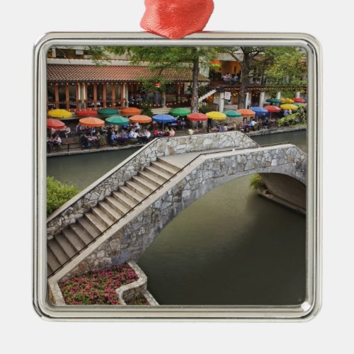 Outdoor cafe along River Walk and bridge over 2 Metal Ornament