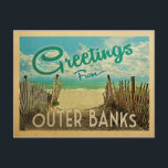 Outer Banks Postcard Beach Vintage Travel<br><div class="desc">This Greetings From Outer Banks vintage postcard design features a sandy beach with a beautiful turquoise ocean water and above the sea,  a blue sky with billowy white clouds. In vintage travels style.</div>
