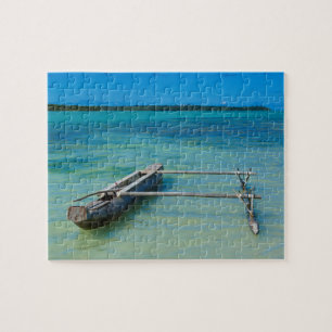 Outrigger Canoe In Shallow Ocean Jigsaw Puzzle