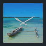 Outrigger Canoe In Shallow Ocean Square Wall Clock<br><div class="desc">Ile des Pins,  New Caledonia,  South Pacific. | Michael Runkel / DanitaDelimont.com | OC19 MRU0035</div>
