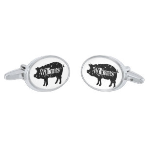 Oval cufflinks with vintage pig silhouette