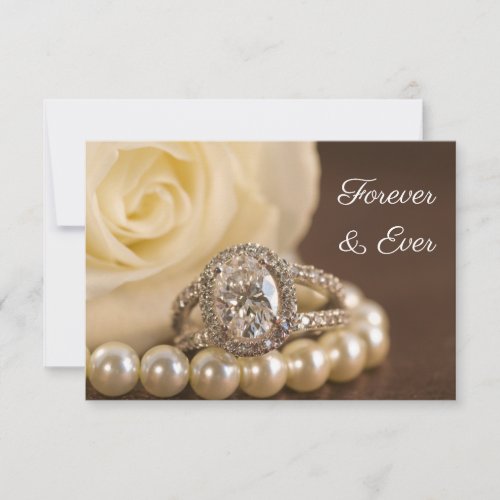 Oval Diamond Ring and White Rose Wedding Save The Date