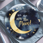 Over the Moon Celestial Baby Shower Stars Space Paper Plates<br><div class="desc">Celebrate the arrival of a new little star with these enchanting baby shower paper plates, featuring a radiant golden moon and shimmering stars on a deep blue space background, all beautifully rendered in watercolors. The header, "We are over the Moon!", adds a touch of joy and excitement to this celestial-themed...</div>