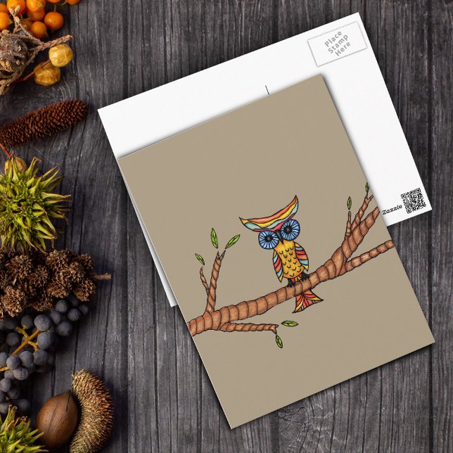 Owl on a Branch Postcard (Colourful fantasy own blue eyes on tree branch on light brown postcard.)