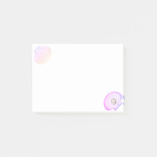 Oyster shell with pearl on white post-it notes