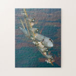 P-3C ORION (11x14 INCH) Jigsaw Puzzle<br><div class="desc">The P-3 Orion is a four-engine turboprop anti-submarine and maritime surveillance aircraft developed for the United States Navy. A total of 757 P-3s have been built, and the P-8 Poseidon will eventually replace the U.S. Navy's remaining P-3C aircraft. The visual information within this product has been provided by Wings In...</div>