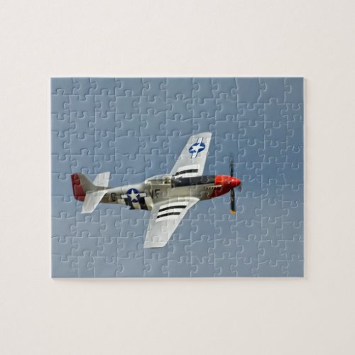 P_51D Mustang Fighter with D_Day markings flying Jigsaw Puzzle