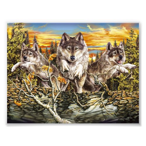Pack of wolves jumping over a log photo print