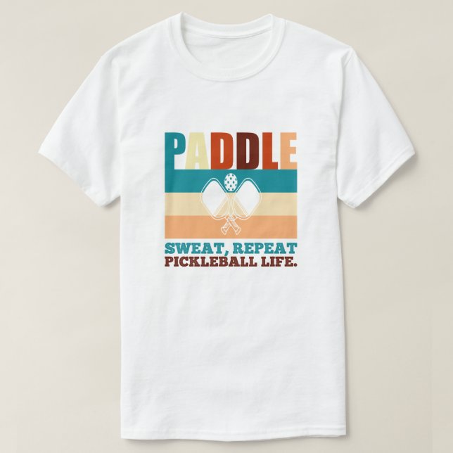 Paddle, sweat, repeat pickleball life. Funny Quote T-Shirt (Design Front)