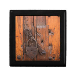 Padlock on wooden door jewelry box