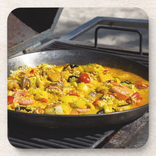 Paella is cooked on a grill drink coaster