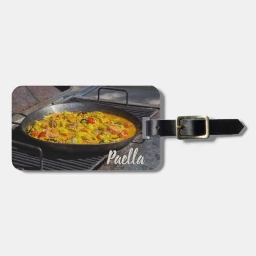Paella is cooked on a grill gift for chef luggage tag