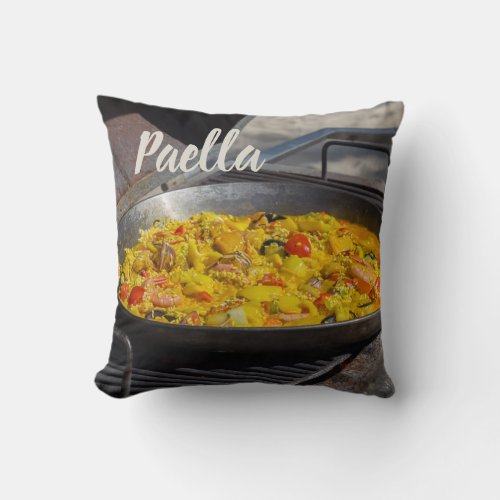 Paella is cooked on a grill gift for chef throw pillow
