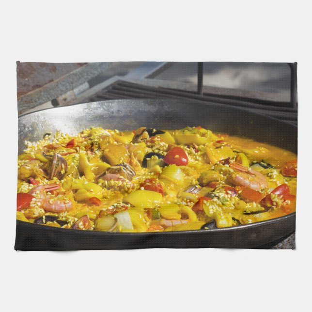 Paella is cooked on a grill towel (Horizontal)