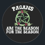Pagans are the reason for the season  classic round sticker<br><div class="desc">In ancient woods where whispers play, Amidst the stars, 'neath moon's array, Where earth and sky entwine in rhyme, Pagans weave tales in wintertime. They danced around the Yule's bright fire, To honor solstice, hearts aspire, Through folklore's lore and mystic bond, The season's essence, deeply fond. When darkness veils the...</div>