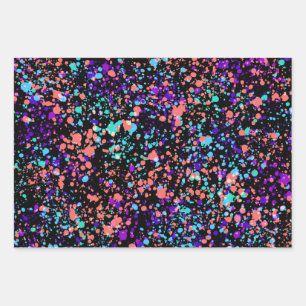 paint splashes green purple coral on black wrapping paper sheets