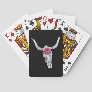 painted cow skull on black poker cards