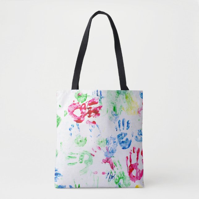 painted kid hand prints on white tote bag (Front)