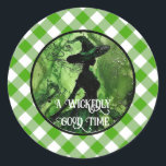 Painted Wickedly Good Witch Green Gingham Plaid Classic Round Sticker<br><div class="desc">Painted Wickedly Good Witch Green Gingham Plaid Stickers - These stickers feature a green and black painting of a witch in an enchanted forest on top of a white and green gingham checkered plaid pattern. Perfect for any age girl or woman's birthday or for a Halloween Party. Designed for those...</div>