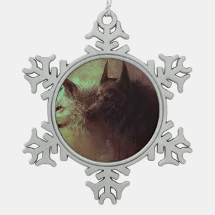 Painting of black wolf and white wolf. snowflake pewter christmas ornament