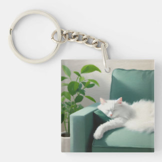 Painting of Cat Sleeping on a Green Couch Keychain