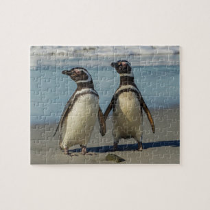 Pair of penguins on the beach jigsaw puzzle