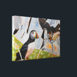 Pair of Puffins Canvas Print<br><div class="desc">Puffins nest on the Wales coast cliffs during May to June and in July are getting their chicks ready to leave the nest. I've always loved their boldly coloured beaks and comical flight.</div>