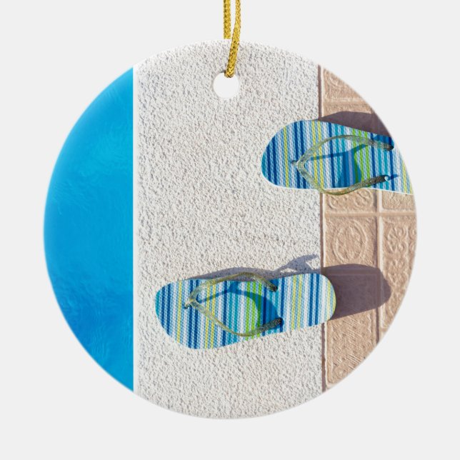 Pair of slippers at edge of swimming pool ceramic ornament (Front)
