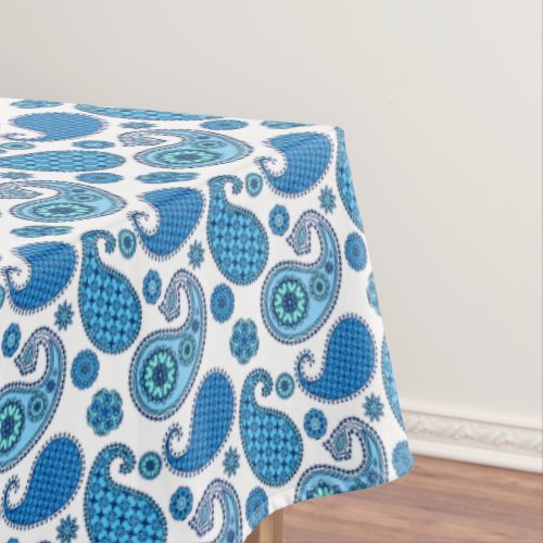 Paisley pattern shades of blue on white tablecloth