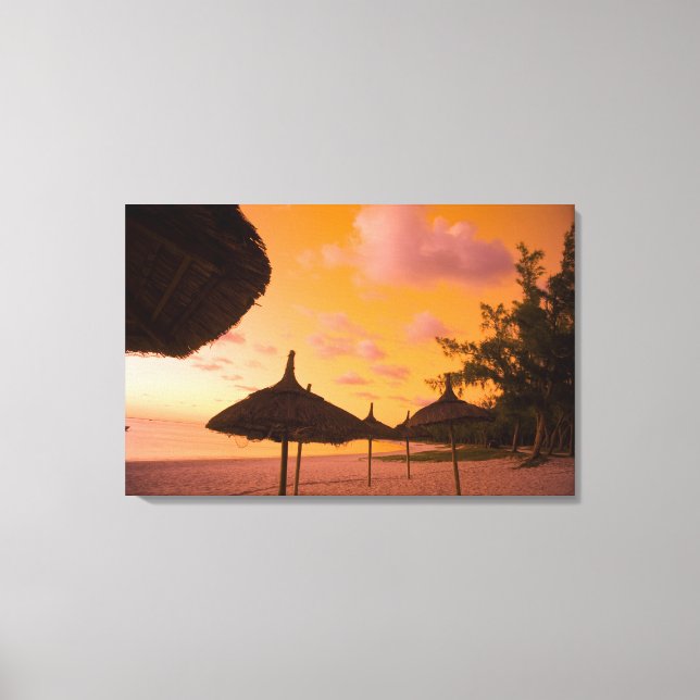 Palapa style beach huts at sunrise, Belle Mare 2 Canvas Print (Front)