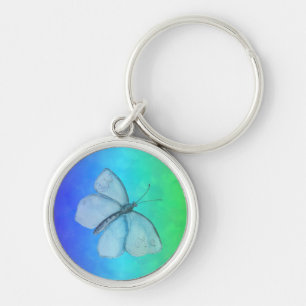 Pale Blue Butterfly on Blue Background Silver Keychain